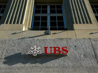 FILE PHOTO: A logo of Swiss bank UBS is seen on their branch in Bern, Switzerland, April 21, 2026. REUTERS/Denis Balibouse/File Photo