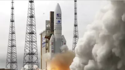 In this image provided by the European Space Agency, an Ariane rocket carrying the robotic explorer Juice takes off from Europe's Spaceport in French Guiana, Friday, April 14, 2023. European spacecraft has blasted off on a quest to explore Jupiter and three of its ice-encrusted moons. Dubbed Juice, the robotic explorer set off on an eight-year journey Friday from French Guiana in South America, launching atop an Ariane rocket. (ESA via AP)