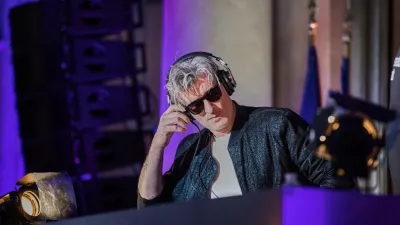 FILE - French Vincent Belorgey, known as Kavinsky, performs during the 'Fete de la Musique', the music day celebration in the courtyard of the Elysee Palace, in Paris, Thursday, 21 June 2018. (Christophe Petit Tesson, Pool via AP, FILE)