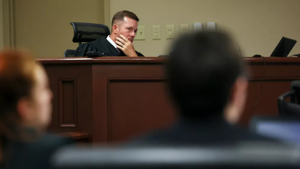 Judge Nicholas Primm reacts during the sentencing for Colt Gray, right, the 16-year-old Apalachee High School shooting suspect, at Barrow County Superior Court, Monday, July 27, 2026, in Winder, Ga. (Jason Getz/Atlanta Journal-Constitution via AP) 