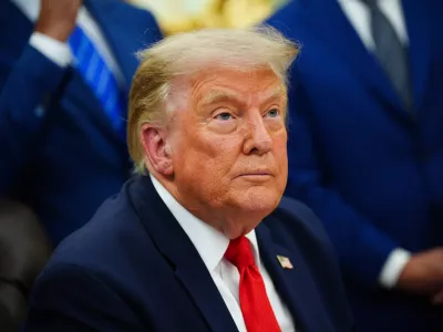 President Donald Trump speaks about Dulles International Airport modernization, in the Oval Office of the White House, Wednesday, July 29, 2026, in Washington. (AP Photo/Julia Demaree Nikhinson)