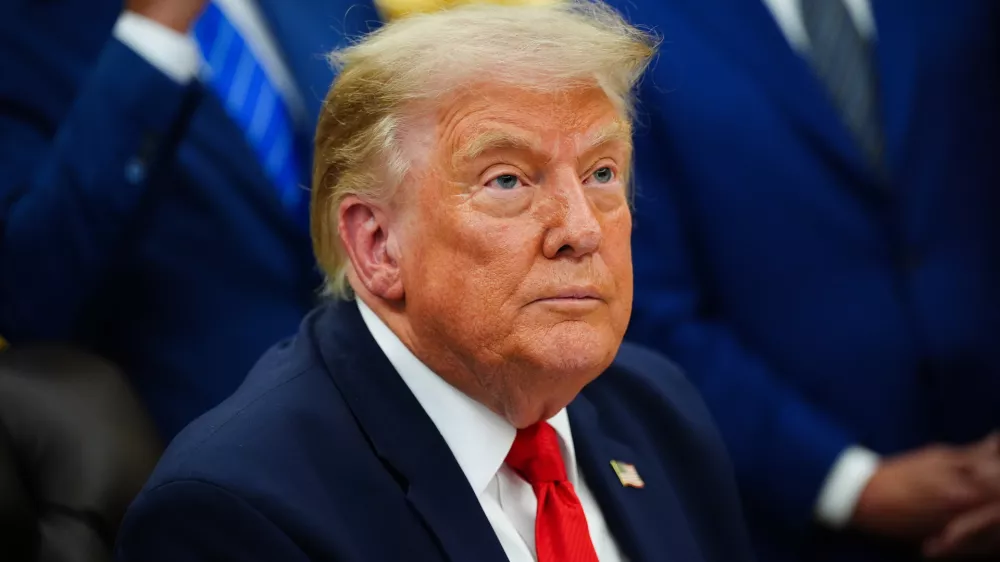 President Donald Trump speaks about Dulles International Airport modernization, in the Oval Office of the White House, Wednesday, July 29, 2026, in Washington. (AP Photo/Julia Demaree Nikhinson)