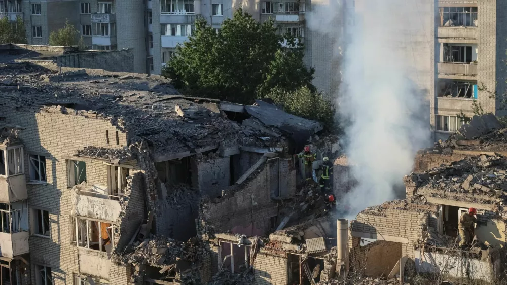 Rescuers work at the site of an apartment building hit by a Russian missile strike, amid Russia's attack on Ukraine, in Lviv, Ukraine July 30, 2026. REUTERS/Roman Baluk