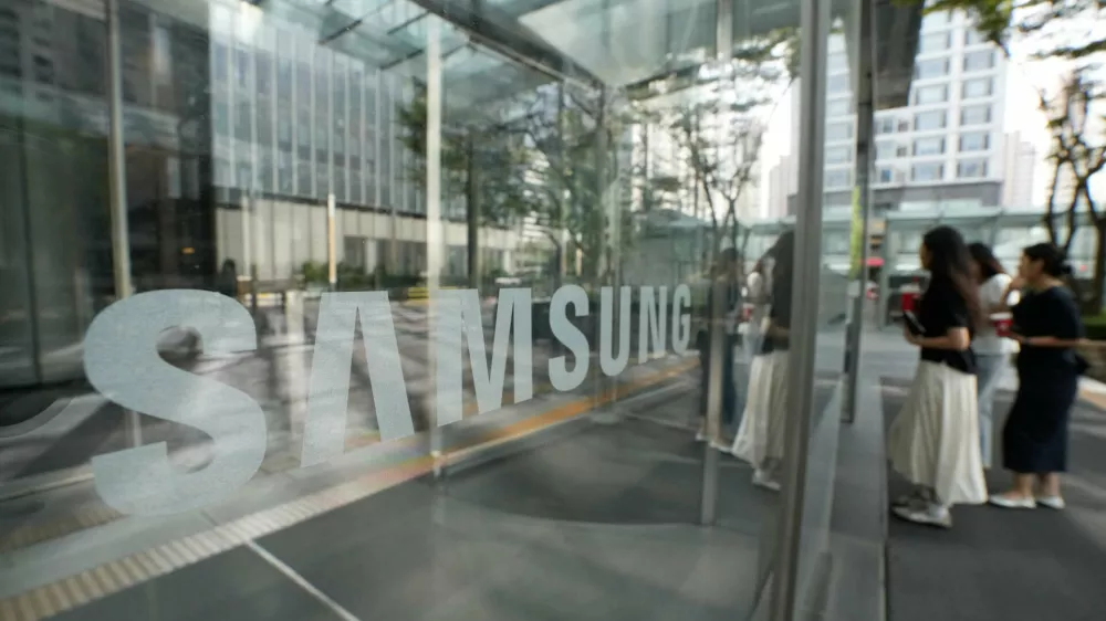 The logo of the Samsung Electronics Co. is seen at its office in Seoul, South Korea, Thursday, July 30, 2026. (AP Photo/Ahn Young-joon)