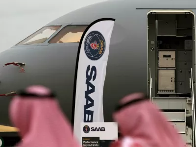 FILE PHOTO: Vistors walk past a GlobalEye aircraft, manufactured by Saab Technologies, on static display during the fifth day of Dubai Air Show in Dubai, United Arab Emirates November 21, 2019. Picture taken November 21, 2019. REUTERS/Christopher Pike/File Photo