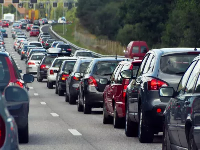 Typical scene during rush hour. A traffic jam with rows of cars. Shallow depth of field.