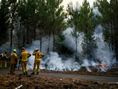 FILE PHOTO: Firefighters carry out controlled burning operations in Le Porge, Gironde department, amid drought conditions following a heatwave and water shortages across much of France, July 30, 2026. REUTERS/Sarah Meyssonnier/File Photo