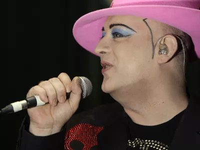 ** FILE ** In this Dec. 16, 2008 file photo, British singer Boy George performs onstage at Le Pigalle Club in central London. A British judge on Friday, Jan. 16, 2009 sentenced former Culture Club frontman Boy George to 15 months in jail after he was convicted of falsely imprisoning a male escort. (AP Photo/Joel Ryan, File)