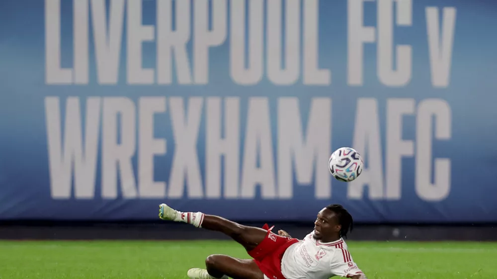 Jul 29, 2026; New York, New York, USA; Liverpool FC defender Jeremie Frimpong (30) passes the ball against Wrexham AFC during the second half at Yankee Stadium. Mandatory Credit: Brad Penner-Imagn Images