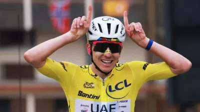 Cycling - Tour de France - Stage 20 - Le Bourg d'Oisans to Alpe d'Huez - Alpe d'Huez, France - July 25, 2026 UAE Team Emirates XRG's Tadej Pogacar wearing the yellow jersey reacts at the end of stage 20 REUTERS/Stephanie Lecocq