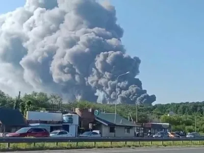 Smoke rises after a Ukrainian drone attack on a Wildberries warehouse, in Novosemeykino, Samara region, Russia, August 2, 2026, in this still image obtained from a video. SOCIAL MEDIA/via REUTERS THIS IMAGE HAS BEEN SUPPLIED BY A THIRD PARTY. NO RESALES. NO ARCHIVES. NEWS USE ONLY. Verification Lines: Reuters verified the location from the buildings, the trees and the road layout seen in the video, which matched archive and satellite imagery of the area. The date when the video was recorded was verified by a statement from the governor of Samara region, who said on August 2 that a drone attack on a Wildberries warehouse in the region had occurred. The direction of the smoke seen in the video is consistent with the location of the Wildberries warehouse. NASA Firms (NASA's global tracking fire map) also detected thermal activity near the warehouse's location on August 2.