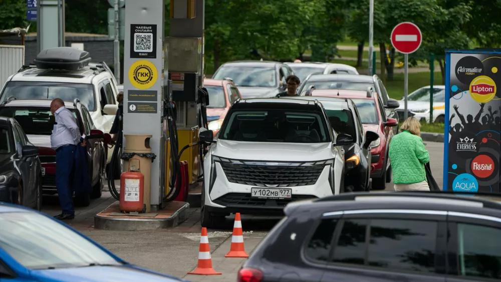 Vehicles refuel at a Rosneft gas station in Moscow, Monday, June 29, 2026. (AP Photo/Alexander Zemlianichenko)
