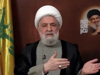 Lebanon's Hezbollah leader Sheikh Naim Qassem delivers an address from an unknown location, November 29, 2024, in this still image from video. Al Manar TV/Reuters TV via REUTERS THIS IMAGE HAS BEEN SUPPLIED BY A THIRD PARTY