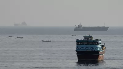 FILE PHOTO: Vessels in the Strait of Hormuz, as seen from Musandam, Oman, August 3, 2026. REUTERS/Stringer/File Photo