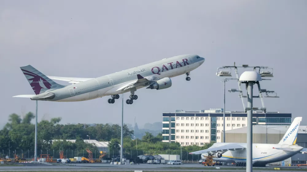 FILE -A Qatar Airways plane takes off from Leipzig/Halle Airport, July 18, 2025, Saxony, Schkeuditz. (Jan Woitas/dpa/dpa via AP, File)