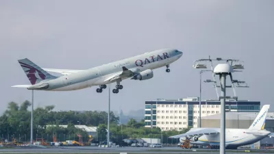 FILE -A Qatar Airways plane takes off from Leipzig/Halle Airport, July 18, 2025, Saxony, Schkeuditz. (Jan Woitas/dpa/dpa via AP, File)