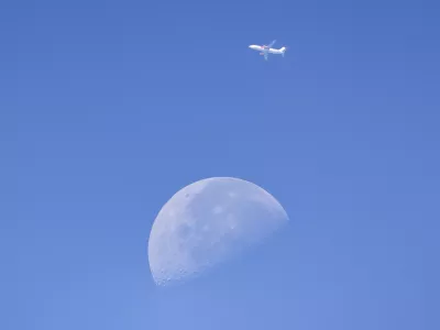 A commercial aircraft passes in front of the Moon above Sofia, Bulgaria, on August 5, 2026. The photograph was taken as astronomers and skywatchers observed the widely anticipated impact of a SpaceX Falcon 9 upper stage with the lunar surface during a closely followed space event.