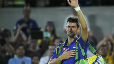 2016 Rio Olympics - Tennis - Preliminary - Men's Singles First Round - Olympic Tennis Centre - Rio de Janeiro, Brazil - 07/08/2016. Novak Djokovic (SRB) of Serbia reacts after losing his match against Juan Martin Del Potro (ARG) of Argentina. REUTERS/Toby Melville TPX IMAGES OF THE DAY. FOR EDITORIAL USE ONLY. NOT FOR SALE FOR MARKETING OR ADVERTISING CAMPAIGNS.