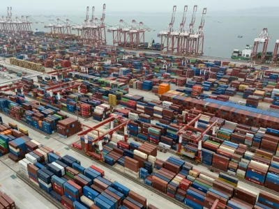 FILE - Shipping containers are seen ready for transport at the Guangzhou Port in the Nansha district in southern China's Guangdong province, April 17, 2025. (AP Photo/Ng Han Guan, File)
