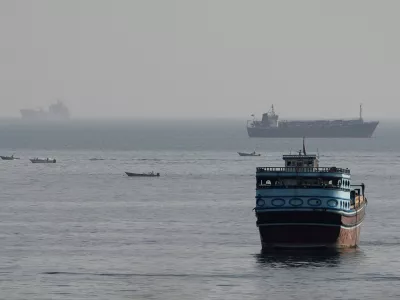 FILE PHOTO: Vessels in the Strait of Hormuz, as seen from Musandam, Oman, August 3, 2026. REUTERS/Stringer/File Photo