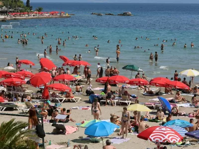 SPLIT, July 20, 2026 -- People enjoy leisure time at Bacvice Beach in Split, Croatia, on July 19, 2026.,Image: 1117480162, License: Rights-managed, Restrictions:, Model Release: no 