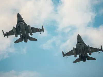 Romanian F-16 fighter jets fly during an air policing exercise at Borcea Air Base 86, amid heightened security concerns over cross-border drone incursions linked to Russia's war in Ukraine, in Borcea, Romania, Friday, Aug. 7, 2026. (AP Photo/ Vadim Ghirda)