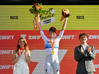 Netherlands' Demi Vollering celebrates on the podium after winning the eighth stage of the Women's Tour de France cycling race (Tour de France Femmes) between Sisteron and Nice in Nice, France, Saturday, Aug. 8, 2026. (AP Photo/Philippe Magoni)