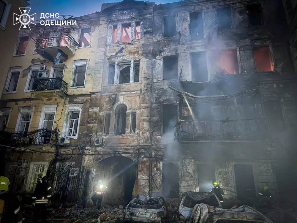 Rescuers work at a site of apartment buildings damaged during a Russian missile and drone strike, amid Russia's attack on Ukraine, in Odesa, Ukraine, in this handout picture released August 9, 2026. Press service of the State Emergency Service of Ukraine in Odesa region/Handout via REUTERS ATTENTION EDITORS - THIS IMAGE HAS BEEN SUPPLIED BY A THIRD PARTY. WATERMARK FROM SOURCE. MANDATORY CREDIT. BEST QUALITY AVAILABLE.
