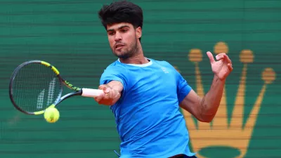 FILE PHOTO: Tennis - ATP Masters 1000 - Monte Carlo Masters - Monte Carlo Country Club, Roquebrune-Cap-Martin, France - April 12, 2026 Spain's Carlos Alcaraz in action during his final match against Italy's Jannik Sinner REUTERS/Manon Cruz/File Photo