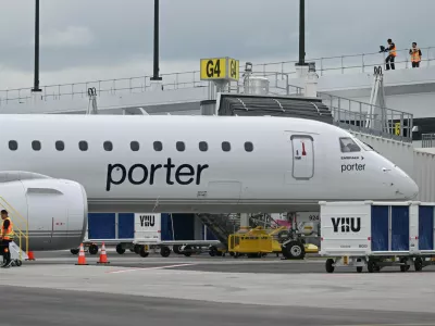 A Porter Airlines jet sits at a gate at Montreal Metropolitan Airport, in Longueuil, Quebec, on Monday, June 15, 2026. (Graham Hughes/The Canadian Press via AP)