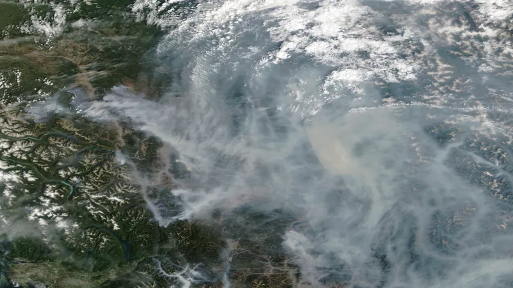 A satellite image shows smoke from wildfires in British Columbia, Canada August 9, 2026. NASA WORLDVIEW/Handout via REUTERS THIS IMAGE HAS BEEN SUPPLIED BY A THIRD PARTY. MANDATORY CREDIT.