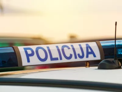 Police car roof sign (policija in croatian language), closeup with selective focus