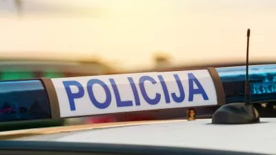 Police car roof sign (policija in croatian language), closeup with selective focus