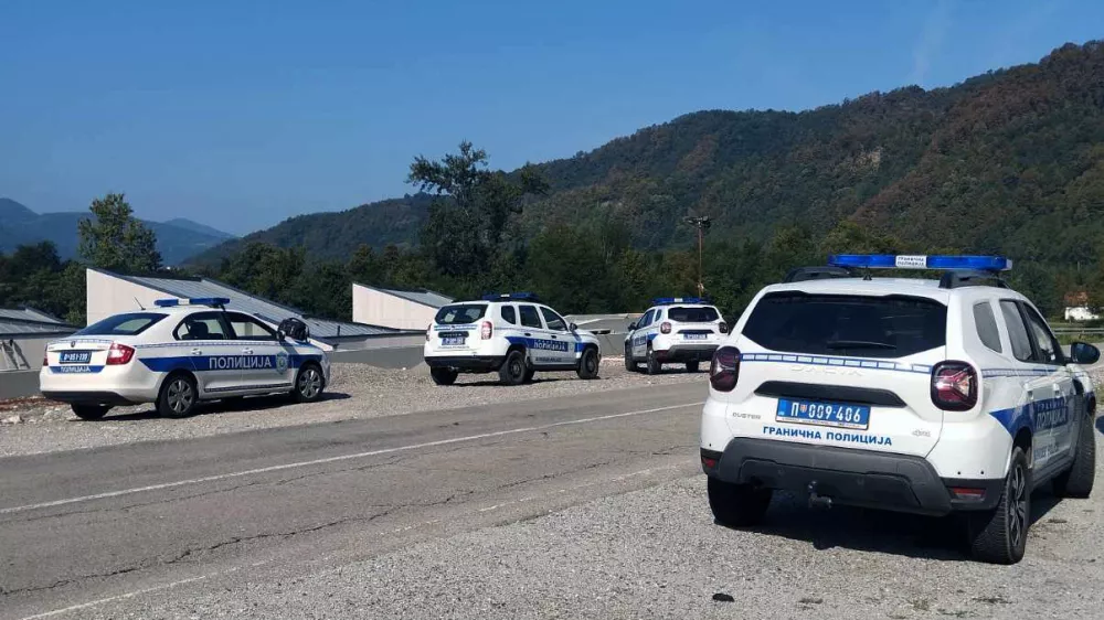 This handout photograph made available by the Ministry of Interior of Serbia shows Serbian Police cars parked near a bank of the Drina River as police search the river after a boat carrying 30 illegal migrants sank on the border between Serbia and Bosnia-Herzegovina, near the town of Ljubovija, on August 22, 2024. Authorities recovered 10 bodies, including an infant, after a boat carrying migrants capsized on August 22, 2024 in the Drina River on the Serbia-Bosnia border, with others still believed missing. Police said the vessel was carrying around two dozen migrants when it flipped near Ljubovija in Serbia, a transit country on the so-called "Balkan route" that migrants use to reach the EU.,Image: 900783743, License: Rights-managed, Restrictions: RESTRICTED TO EDITORIAL USE - MANDATORY CREDIT "AFP PHOTO / Ministry of Interior of Serbia" - NO MARKETING NO ADVERTISING CAMPAIGNS - DISTRIBUTED AS A SERVICE TO CLIENTS, ***HANDOUT image or SOCIAL MEDIA IMAGE or FILMSTILL for EDITORIAL USE ONLY! * Please note: Fees charged by Profimedia are for the Profimedia's services only, and do not, nor are they intended to, convey to the user any ownership of Copyright or License in the material. Profimedia does not claim any ownership including but not limited to Copyright or License in the attached material. By publishing this material you (the user) expressly agree to indemnify and to hold Profimedia and its directors, shareholders and employees harmless from any loss, claims, damages, demands, expenses (including legal fees), or any causes of action or allegation against Profimedia arising out of or connected in any way with publication of the material. Profimedia does not claim any copyright or license in the attached materials. Any downloading fees charged by Profimedia are for Profimedia's services only. * Handling Fee Only ***, Model Release: no 