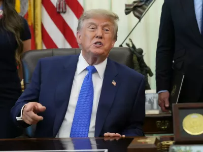President Donald Trump speaks during a meeting to sign an executive order about vaccines, Monday, Aug. 10, 2026, in the Oval Office of the White House in Washington. (AP Photo/Jacquelyn Martin)