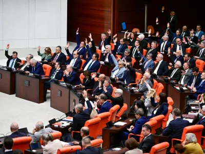 Lawmakers of the ruling AK Party (AKP) attend a voting session on a bill establishing a legal framework for the disbandment of the Kurdistan Workers Party (PKK) at the Turkish parliament in Ankara, Turkey, August 10, 2026. Parliament later passed the bill, a major step toward ending a conflict that has killed tens of thousands. REUTERS/Stringer TURKEY OUT. NO COMMERCIAL OR EDITORIAL SALES IN TURKEY.