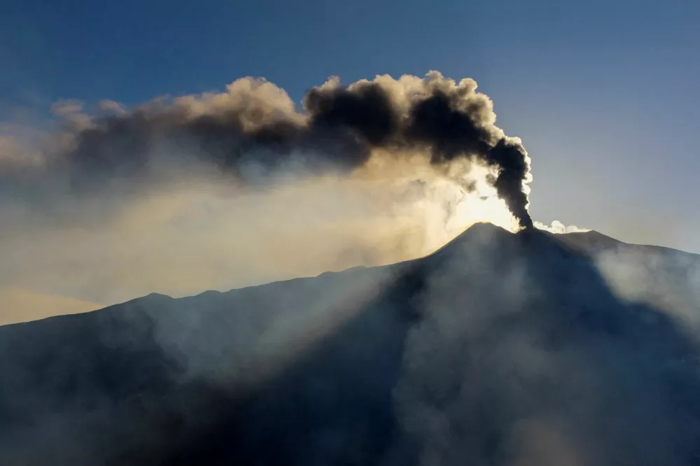 A drone view shows volcanic fumes rising during an eruption at Mount Etna in Sicily, Italy, August 11, 2026. Giuseppe Di Stefano/Etna Walk/via REUTERS ATTENTION EDITORS - THIS IMAGE WAS PROVIDED BY A THIRD PARTY.