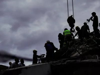 Rescuers work amid the rubble at the Ana Pilar building in the aftermath of an earthquake, in Cali, Colombia, August 12, 2026. REUTERS/Sergio Acero