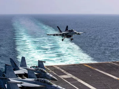 This image provided by U.S. Central Command shows a F/A-18E Super Hornet preparing to make an arrested landing on the USS Abraham Lincoln (CVN 72) after a mission in support of Operation Epic Fury, on Saturday, Feb. 28, 2026. (U.S. Navy via AP)