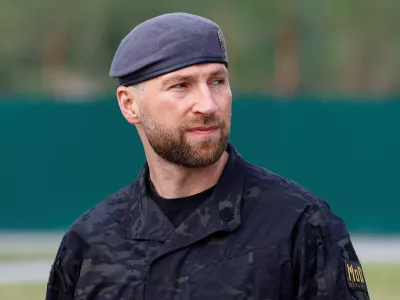 Ukrainian Acting Defence Minister Yevhenii Khmara before a reburial ceremony for Yevhen Konovalets, one of founders and leaders of the Organisation of Ukrainian Nationalists (OUN), at the National Military Memorial Cemetery outside of Kyiv, Ukraine, August 18, 2026. REUTERS/Valentyn Ogirenko