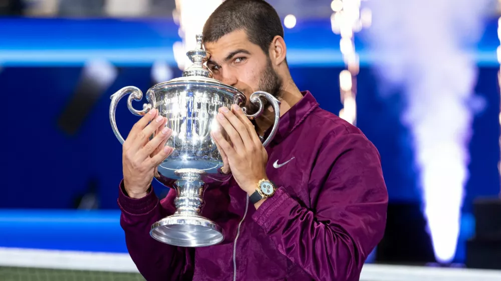 FILE PHOTO: Sep 7, 2025; Flushing, NY, USA; Carlos Alcaraz of Spain with the US Open trophy after winning the final of men's singles at Billie Jean King National Tennis Center. Mandatory Credit: Mike Frey-Imagn Images/File Photo