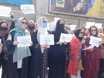 Women hold placards as they protest in Kabul, Afghanistan September 3, 2021 in this still image obtained from a social media video. Facebook @WPPN.AFG/via REUTERS THIS IMAGE HAS BEEN SUPPLIED BY A THIRD PARTY. MANDATORY CREDIT. NO RESALES. NO ARCHIVES.