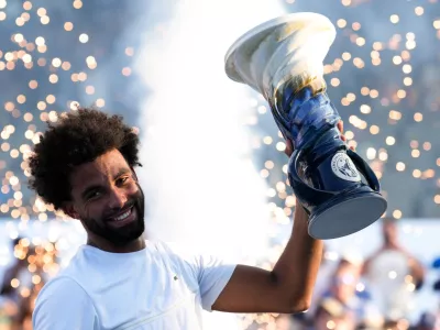 Aug 23, 2026; Cincinnati, OH, USA; Arthur Fils (FRA) celebrates with the Rookwood Cup after defeating Frances Tiafoe (USA) during the finals of the Cincinnati Open at Lindner Family Tennis Center. Mandatory Credit: Aaron Doster-Imagn Images