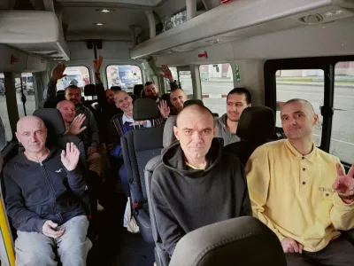 Ukrainian prisoners of war (POWs) gesture after a swap, amid Russia's attack on Ukraine, at an unknown location in Ukraine, in this handout picture released August 24, 2026. Ukraine's President Volodymyr Zelenskiy via Telegram/Handout via REUTERS   THIS IMAGE HAS BEEN SUPPLIED BY A THIRD PARTY. BEST QUALITY AVAILABLE.