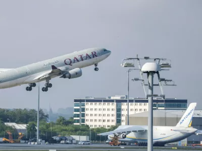 FILE -A Qatar Airways plane takes off from Leipzig/Halle Airport, July 18, 2025, Saxony, Schkeuditz. (Jan Woitas/dpa/dpa via AP, File)