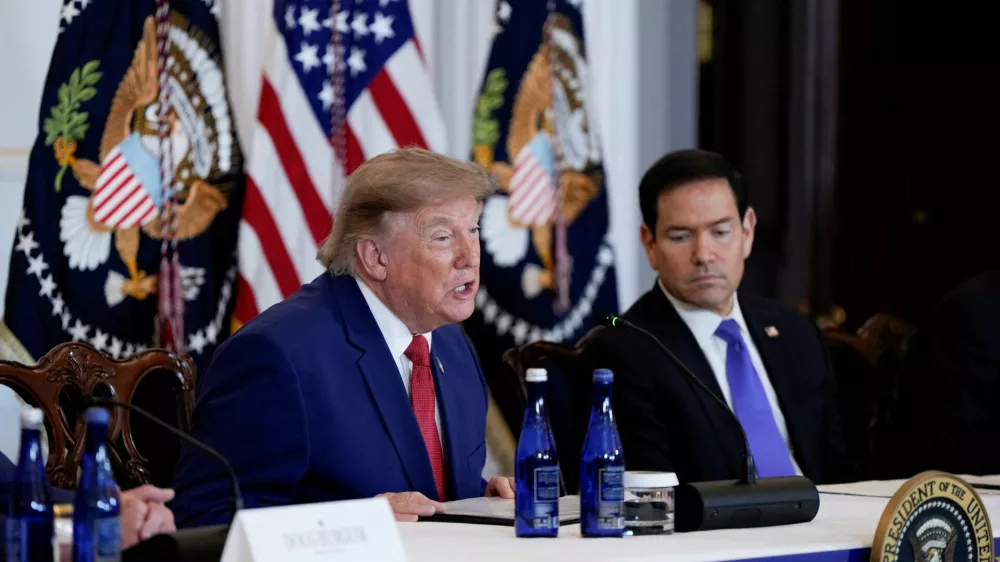 FILE PHOTO: U.S. President Donald Trump speaks next to Secretary of State Marco Rubio during an American Mining Industry Roundtable at the U.S. Department of State in Washington, D.C., U.S., August 7, 2026. REUTERS/Elizabeth Frantz/File Photo