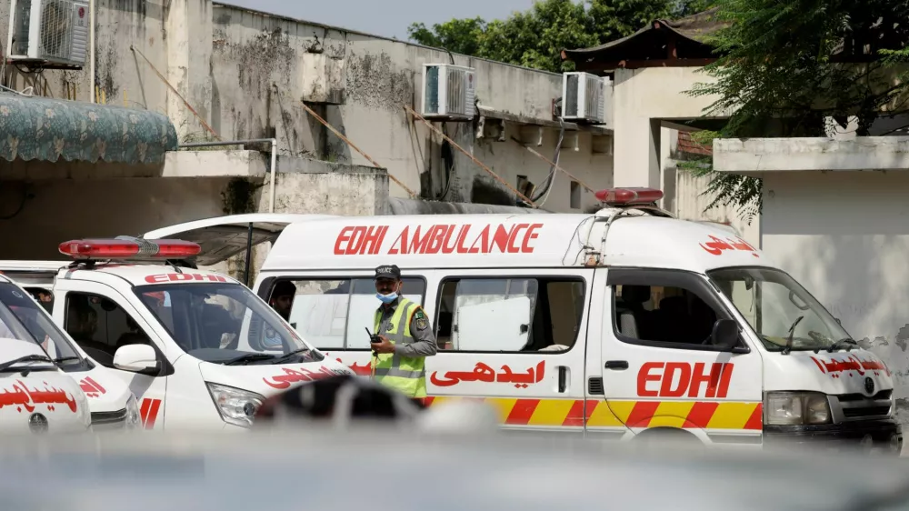 Ambulances are parked outside a mortuary following a deadly fire at the Pakistan Institute of Medical Sciences (PIMS) hospital in Islamabad, Pakistan, August 26, 2026. REUTERS/Akhtar Soomro