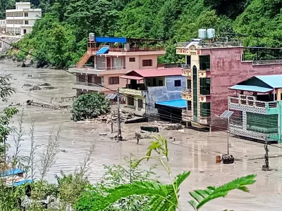 A flooded road following a flash flood in Galchhi in the Dhading district, Nepal, August 26, 2026. Picture taken with a mobile phone. REUTERS/Stringer   TPX IMAGES OF THE DAY