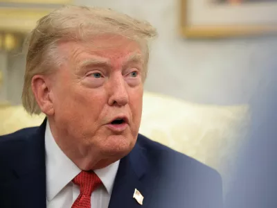 U.S. President Donald Trump speaks as he hosts 16-year-old lifeguard Ryder Williams, who saved a child off the coast of Santa Cruz, California, last month, Nathaniel Rai, the child saved by Williams, and Nathaniel's family members in the Oval Office at the White House in Washington, D.C., U.S., August 17, 2026. REUTERS/Kylie Cooper