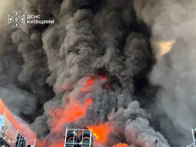 In this photo provided by the Ukrainian Emergency Service, firefighters put out a fire in a warehouse following a Russian drone attack near Kyiv, Ukraine, Saturday, Aug. 29, 2026. (Ukrainian Emergency Service via AP)